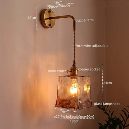 Applique murale Dimoree moderne en cuivre avec abat-jour en verre ambre texturé et bras articulé