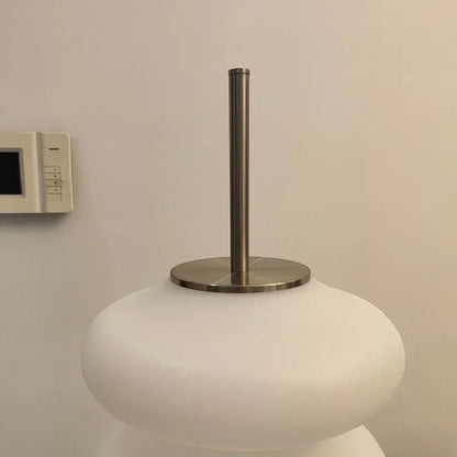 Lampadaire design Dimoree en acrylique blanc avec base et tige en métal brossé pour une lumière douce et moderne
