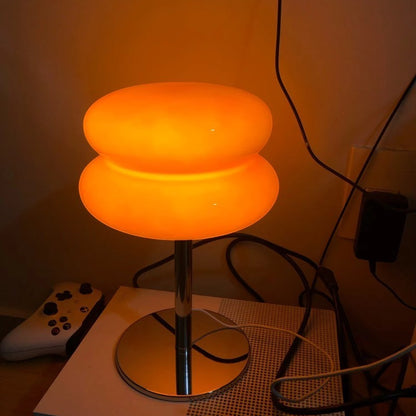 Lampe de table Dimoree en verre soufflé orange en forme de macaron avec pied chromé brillant