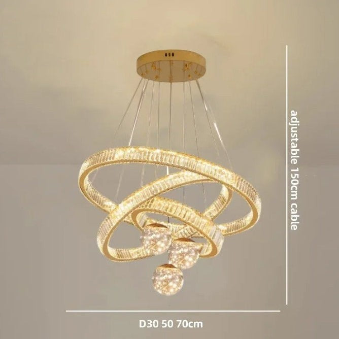 Lustre Dimoree moderne en cristal doré avec trois anneaux lumineux suspendus pour salon ou salle à manger