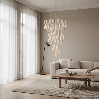 Dimoree lustre moderne doré et blanc avec des rubans torsadés, idéal pour salon et salle à manger.