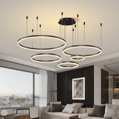 Lustre suspendu Dimoree design industriel avec quatre anneaux lumineux LED noirs pour salon moderne