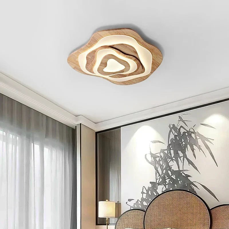 Plafonnier LED Dimoree en bois forme nuage avec éclairage doux pour une décoration intérieure moderne et chaleureuse.
