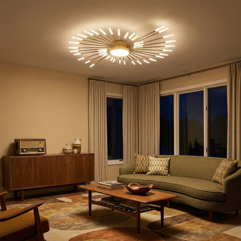 Plafonnier LED design Dimoree en métal doré avec rayons lumineux dans un salon moderne et chaleureux