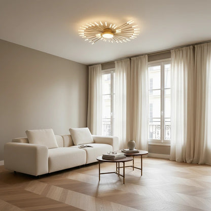 Plafonnier LED design Dimoree doré en forme d'étoile installé au plafond d'un salon moderne et lumineux
