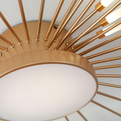 Plafonnier Dimoree moderne étoilé en métal doré avec branches rayonnantes et diffuseur central lumineux.