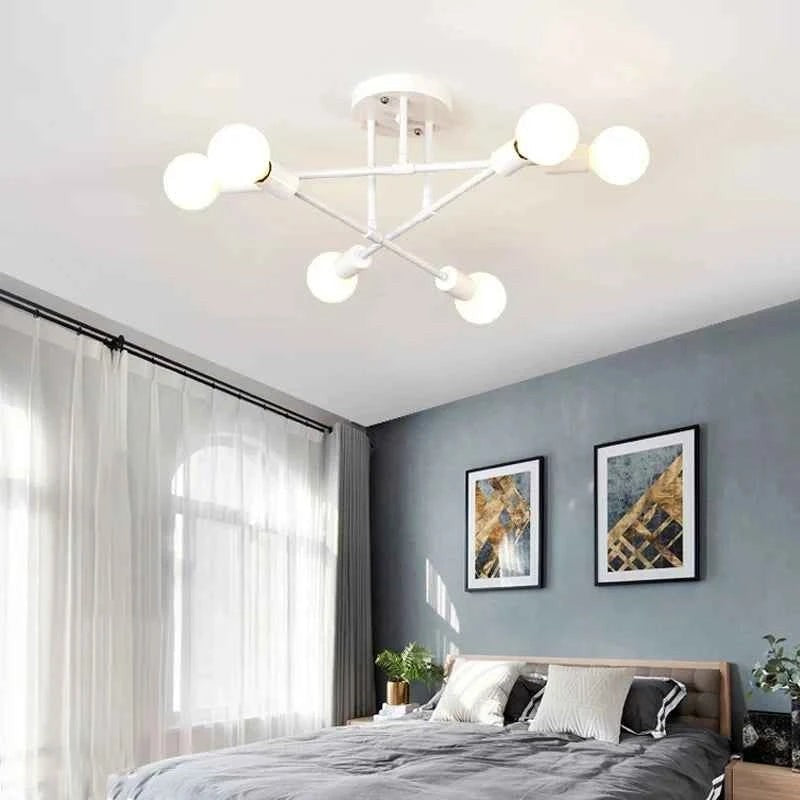 Plafonnier Dimoree au design nordique minimaliste avec structure blanche et six ampoules sphériques dans une chambre