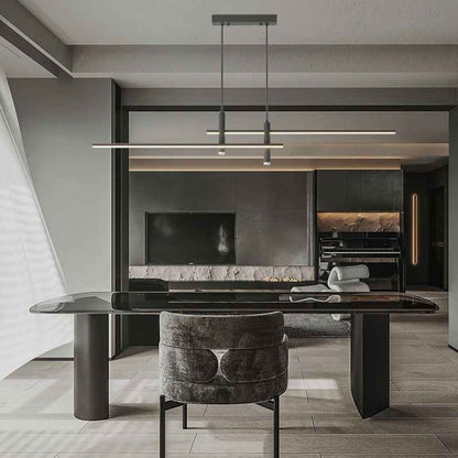 Suspension design minimaliste Dimoree en métal noir au-dessus d'une table de salle à manger moderne