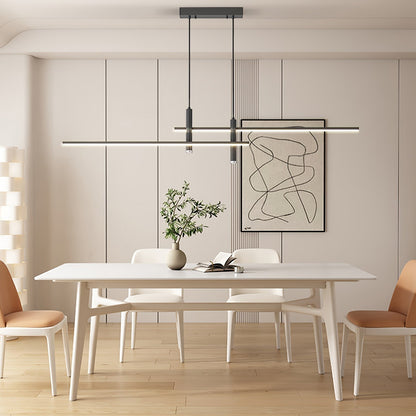 Suspension design minimaliste Dimoree en métal noir au-dessus d'une table à manger moderne dans un salon épuré
