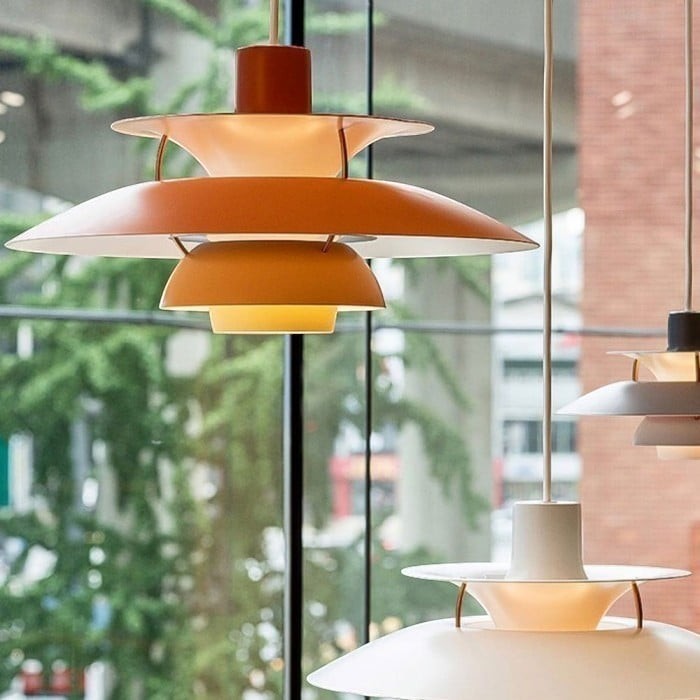 Suspension Dimoree Macaron en métal orange et blanc au design moderne inspiré de Morandi pour éclairage intérieur
