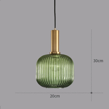 Suspension Dimoree en verre nervuré vert avec structure en métal doré brossé pour un éclairage moderne et élégant.